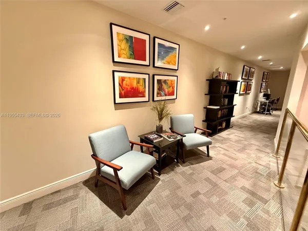 a view of swimming pool from a window