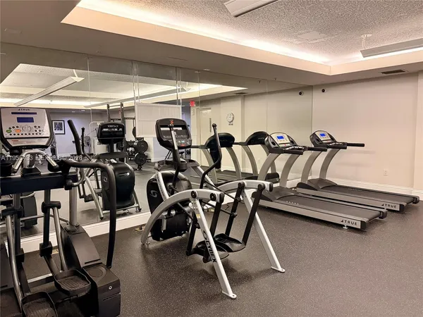 a view of a room with gym equipment