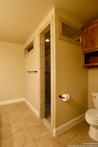 a bathroom with a toilet