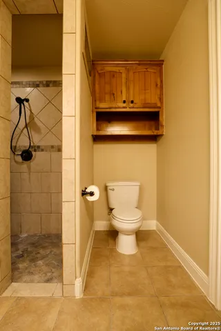 a bathroom with a toilet