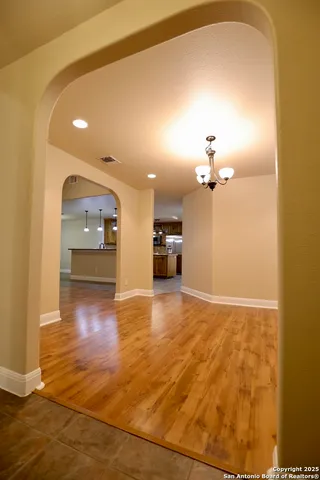 a view of a livingroom with a kitchen