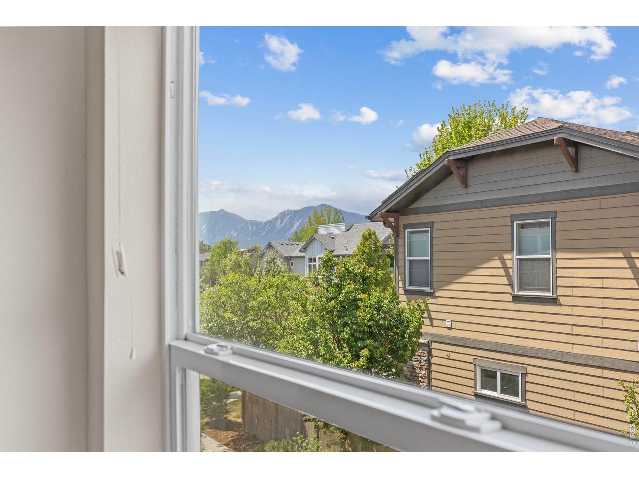 4194 Longview Lane Boulder, CO 80301 - Photo 13 of 30 View of the Flatirons and foothills from the primary bedroom
