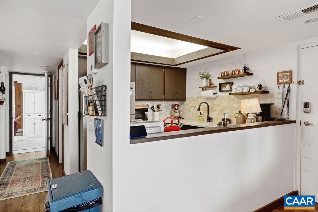 1403 Highlands Roseland, VA 22967 - Photo 16 of 29 a kitchen with stainless steel appliances granite countertop a refrigerator and a sink