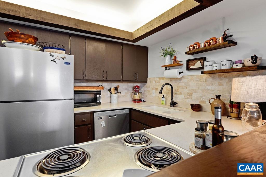 1403 Highlands Roseland, VA 22967 - Photo 18 of 29 a kitchen with a refrigerator and a sink