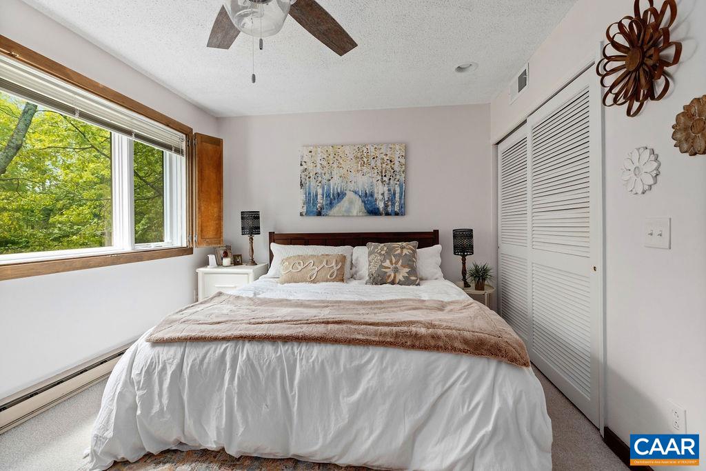 1403 Highlands Roseland, VA 22967 - Photo 21 of 29 a bedroom with a large bed and a window