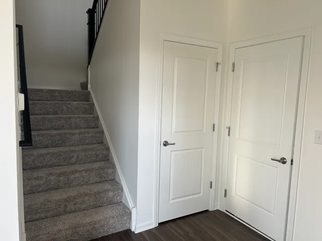 a view of entryway with wooden floor