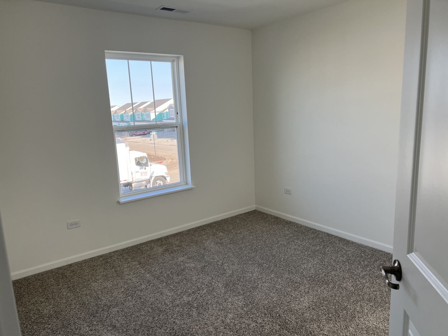 146 Henderson Street Oswego, IL 60543 - Photo 15 of 19 an empty room with a window