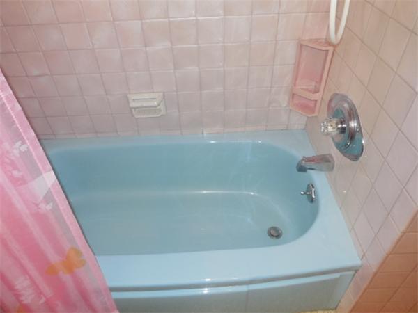 117 Dewitt Street Springfield, MA 01129 - Photo 10 of 14 a close up of a bathtub in a bathroom