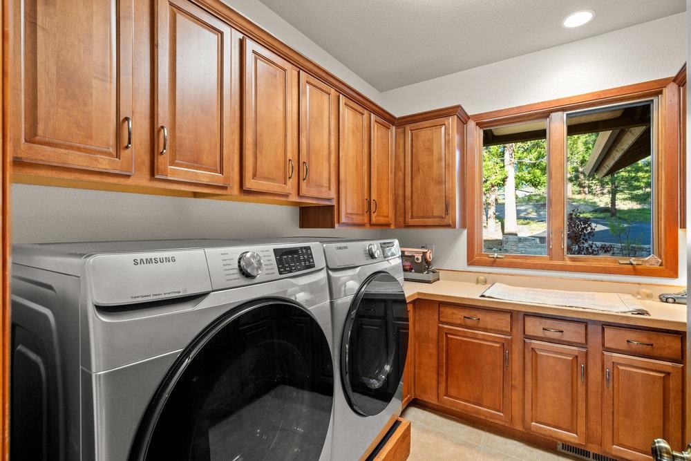 238 Clouds Rest Portola, CA 96122 - Photo 25 of 34 a utility room with dryer and washer