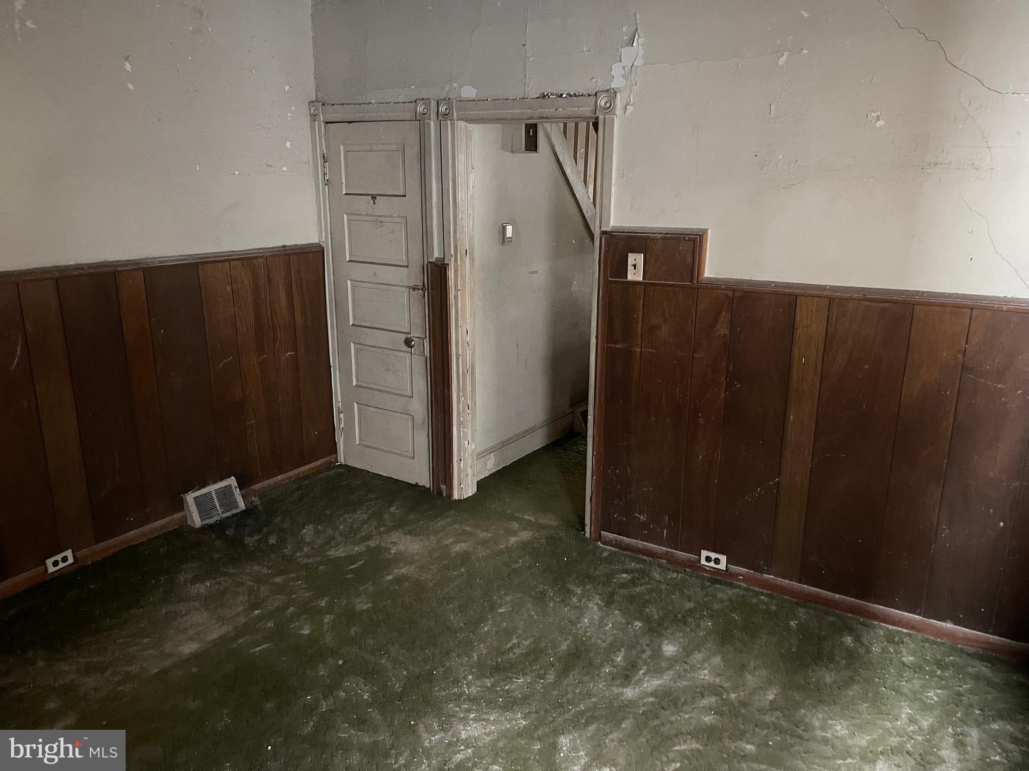 708 Jeffrey Street Chester, PA 19013 - Photo 6 of 13 an empty room with windows