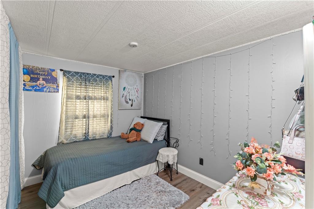 338 Festival Road Washington, PA 15301 - Photo 13 of 18 a bed room with a bed and a window
