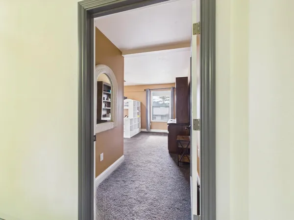 a bedroom with a bed and a cabinets