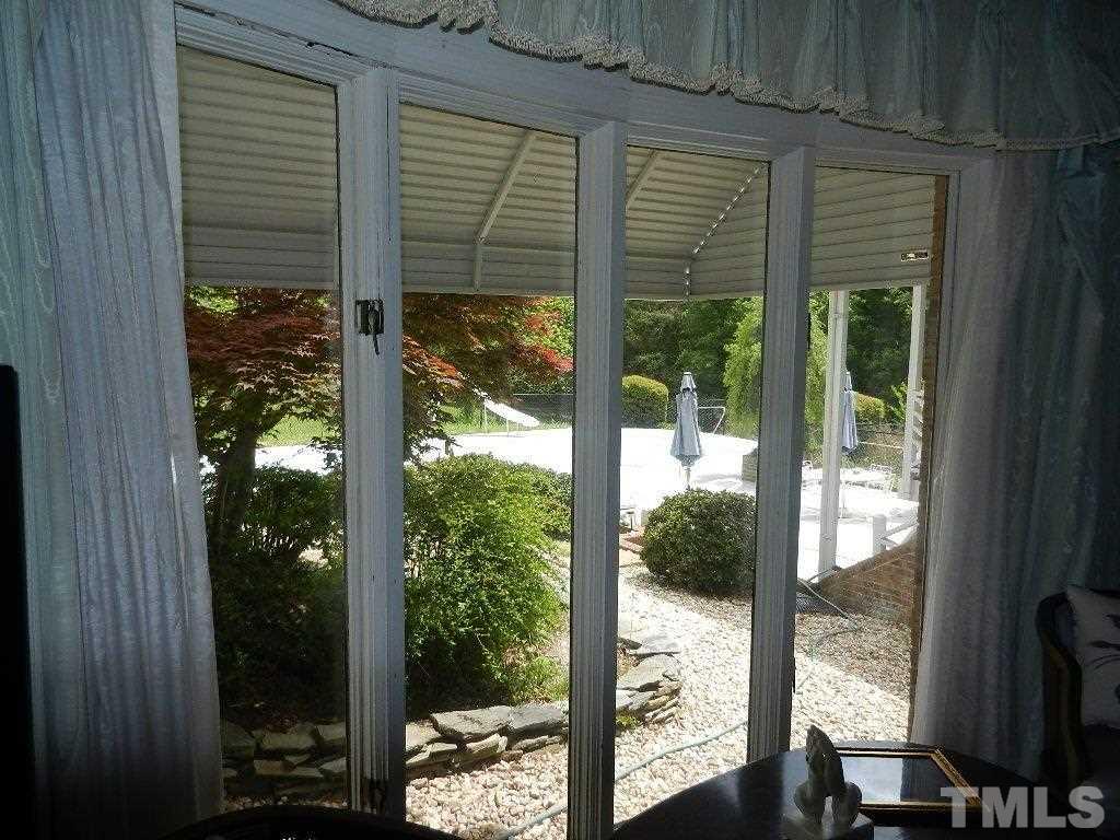 4424 Mitchell Mill Road Wake Forest, NC 27587 - Photo 17 of 25 a view of a room with a large window and front door