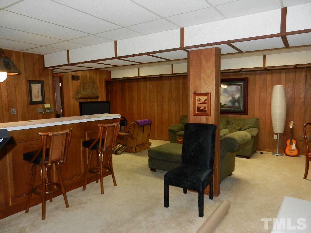 4424 Mitchell Mill Road Wake Forest, NC 27587 - Photo 23 of 25 a living room with furniture and a window