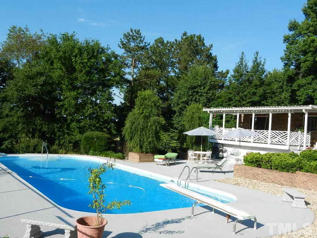 4424 Mitchell Mill Road Wake Forest, NC 27587 - Photo 6 of 25 a view of a house with swimming pool and sitting area