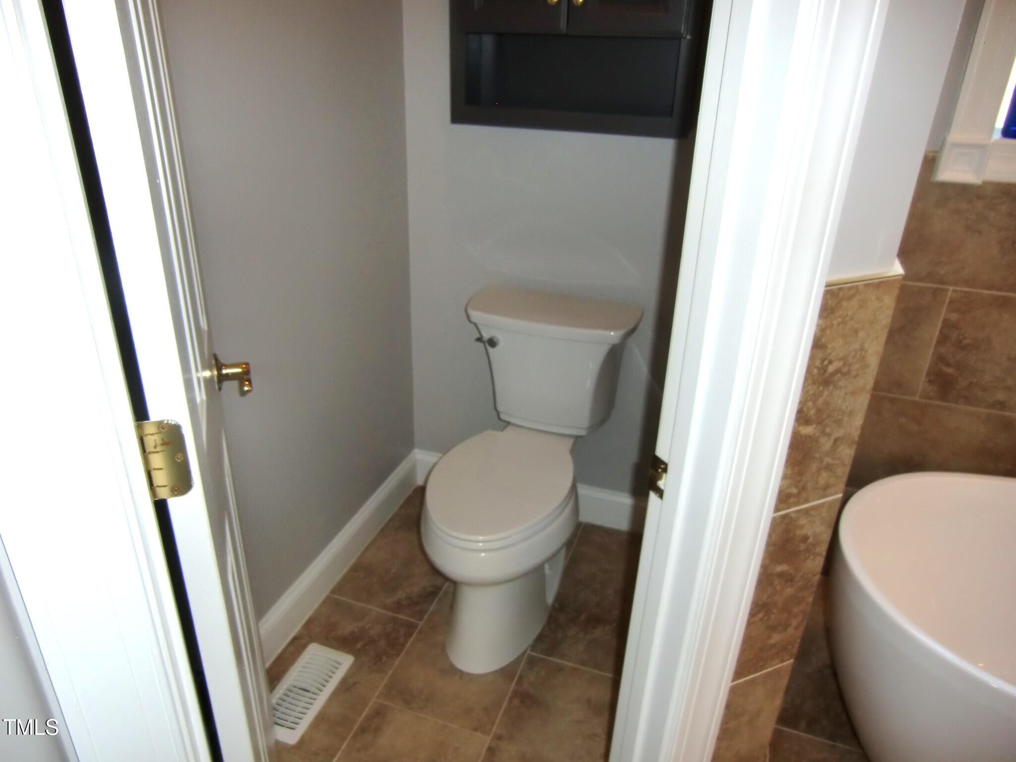 325 Sandy Ridge Road Dunn, NC 28334 - Photo 61 of 97 Owner's Suite