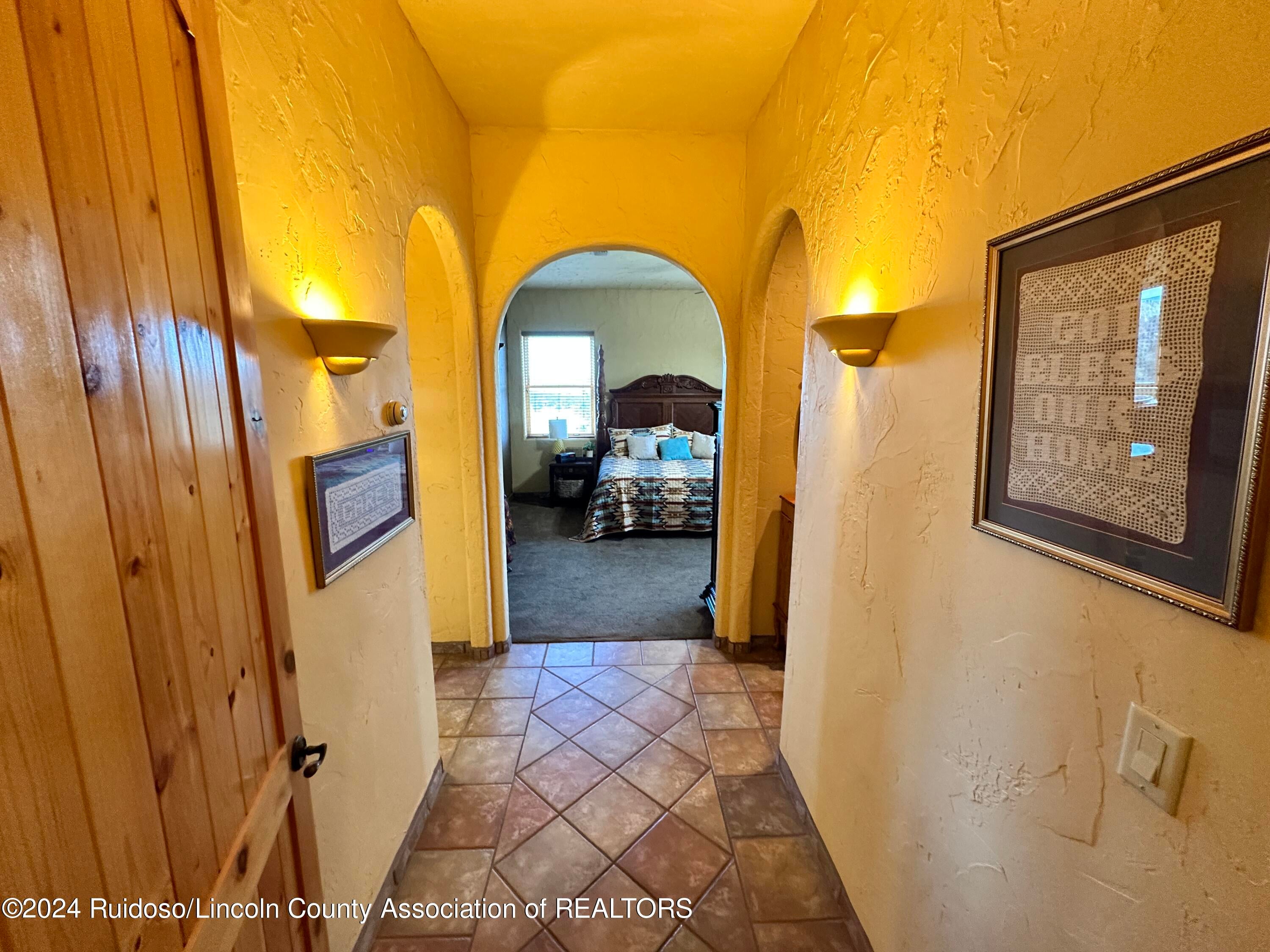 813 Hull Road Ruidoso, NM 88345 - Photo 24 of 59 ENTRY TO PRIMARY BEDROOM