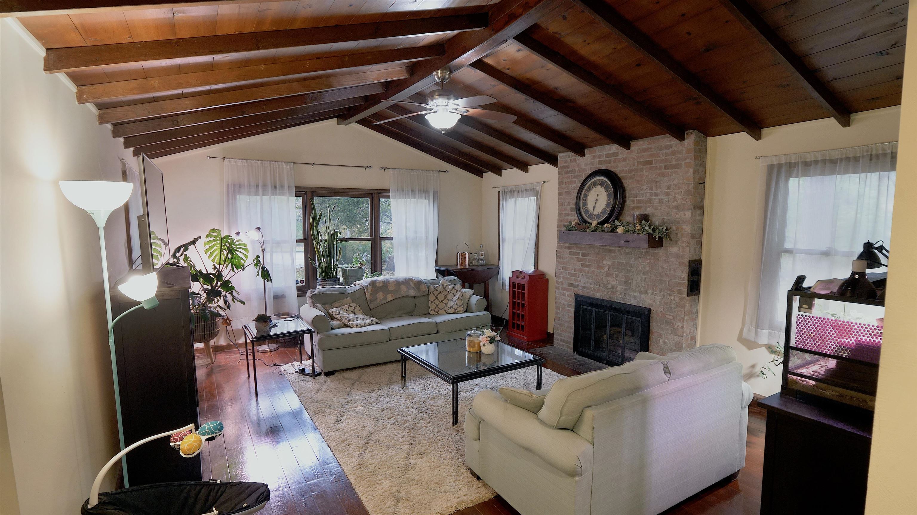 4626 Spring Creek Road Rockford, IL 61114 - Photo 11 of 31 a living room with furniture and a fireplace