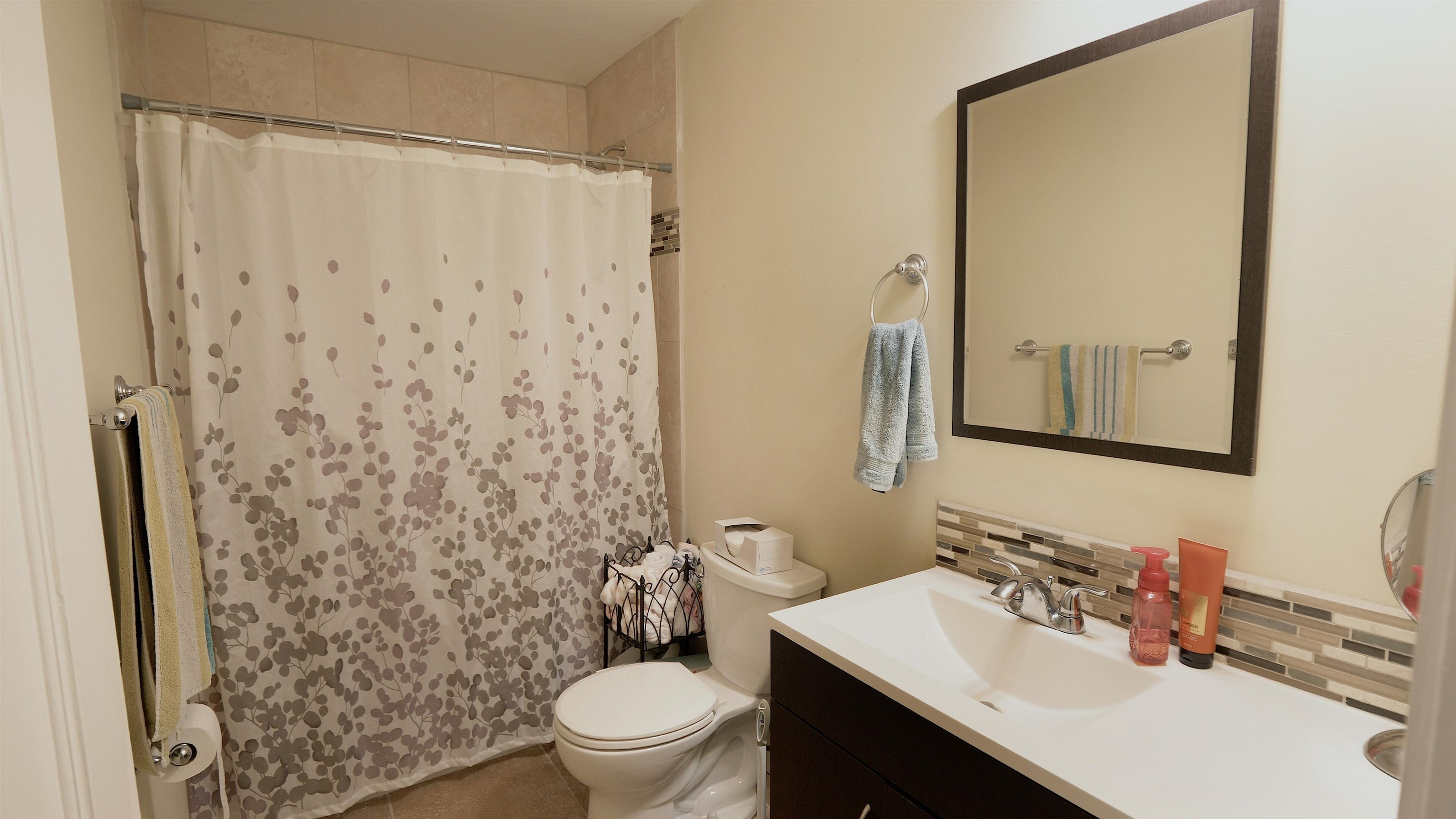 4626 Spring Creek Road Rockford, IL 61114 - Photo 15 of 31 a bathroom with a sink toilet and shower