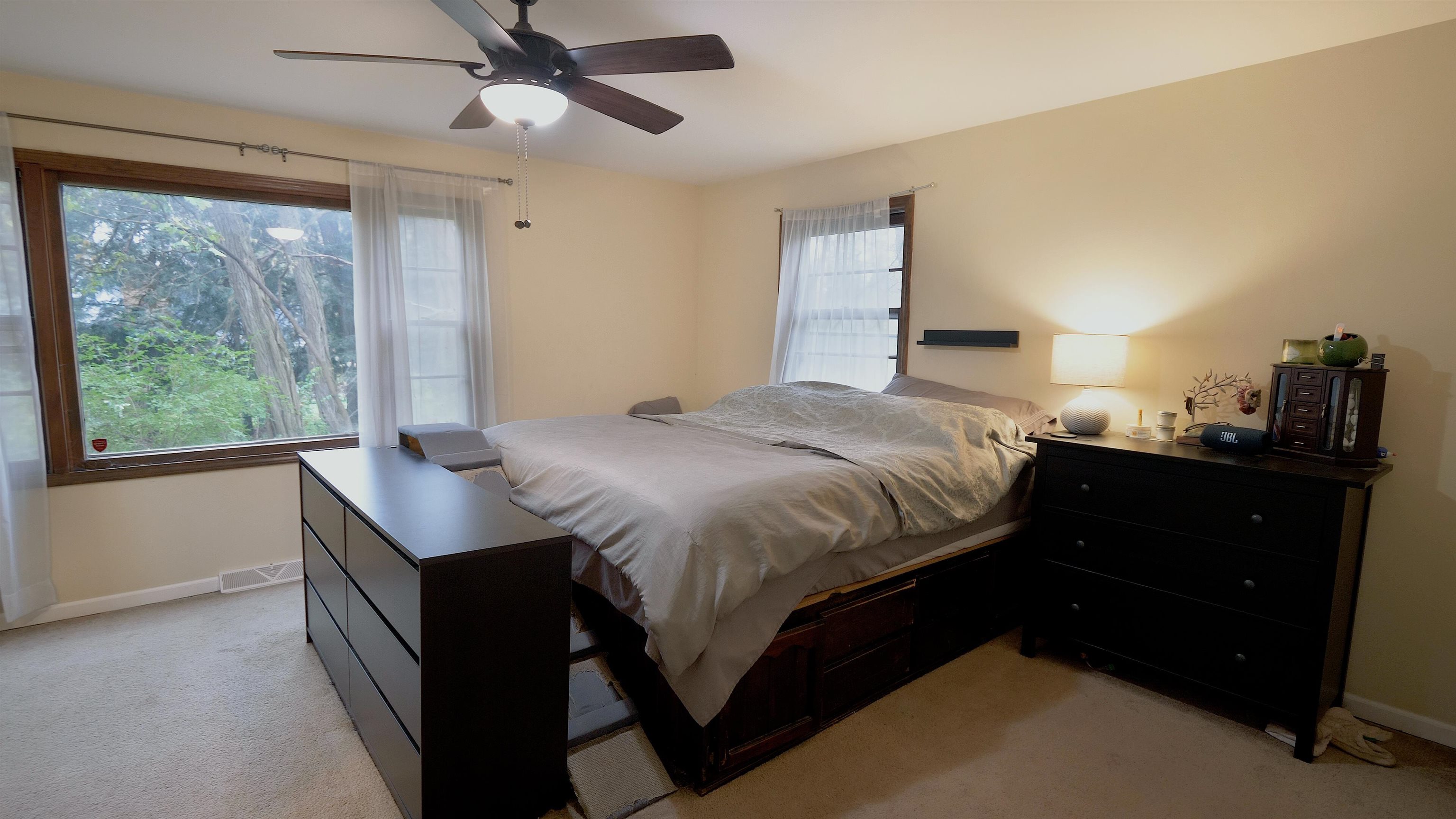 4626 Spring Creek Road Rockford, IL 61114 - Photo 19 of 31 a bedroom with a bed and a window