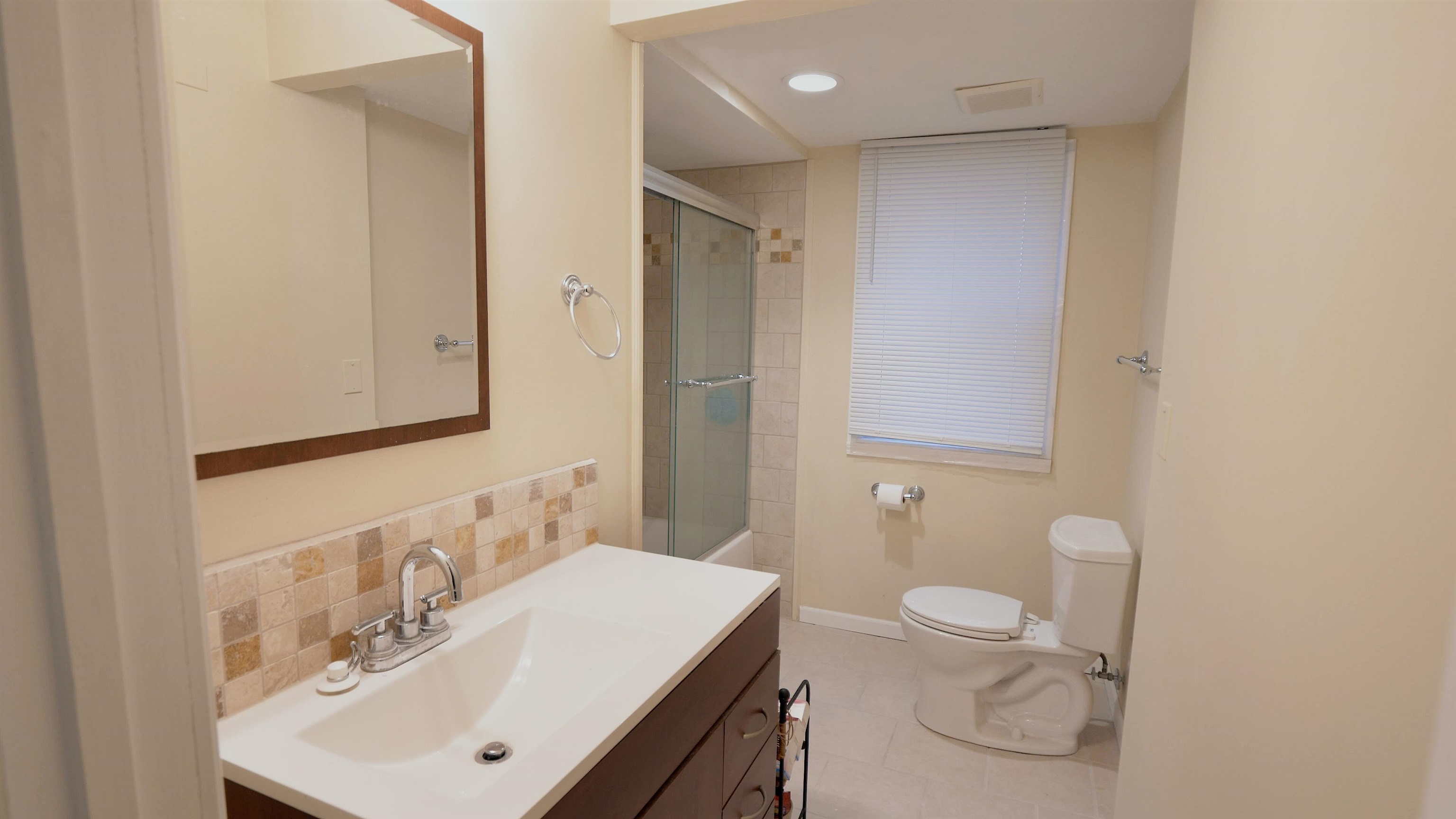 4626 Spring Creek Road Rockford, IL 61114 - Photo 25 of 31 a bathroom with a sink toilet and shower