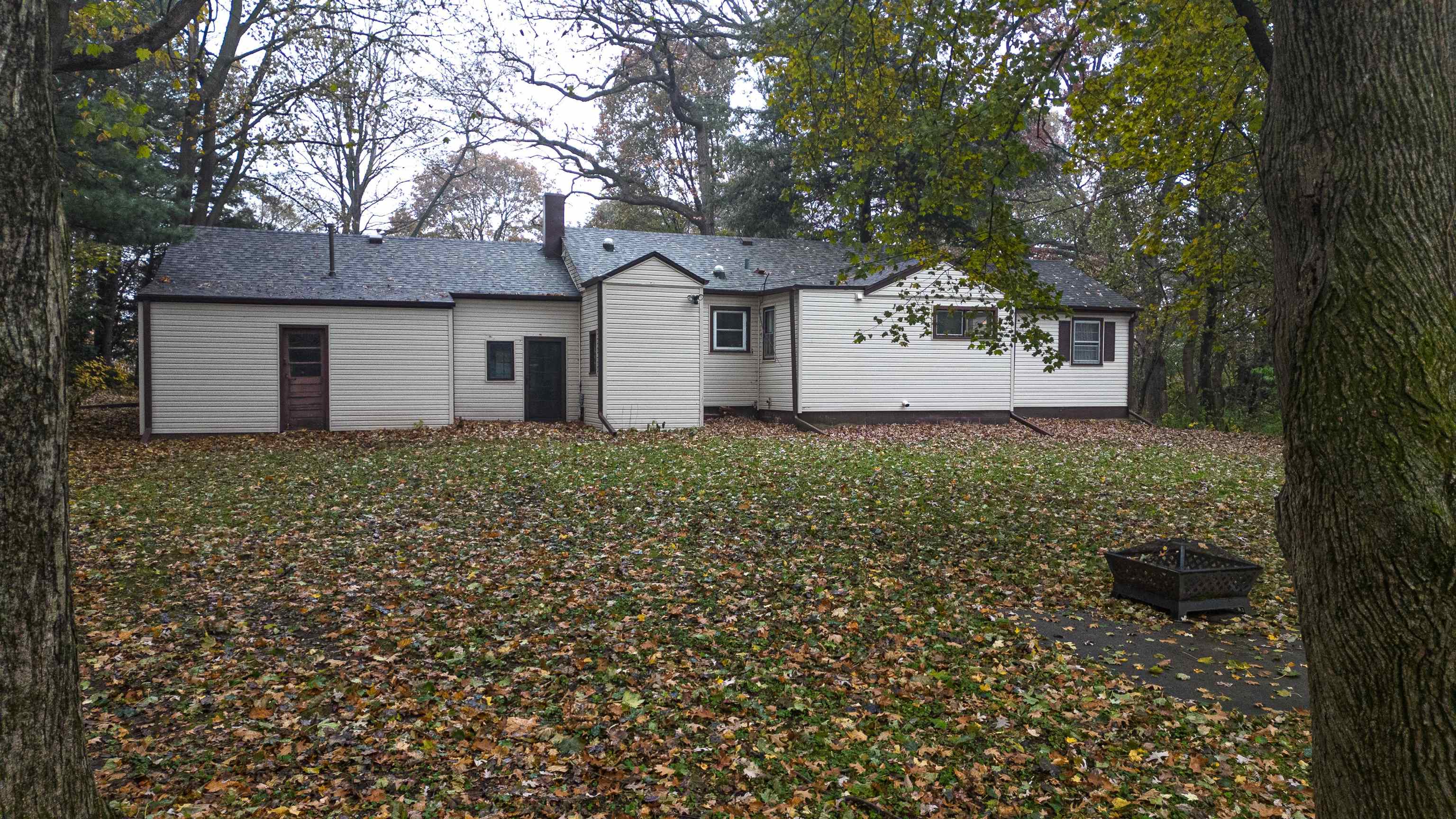 4626 Spring Creek Road Rockford, IL 61114 - Photo 27 of 31 a front view of a house with a yard