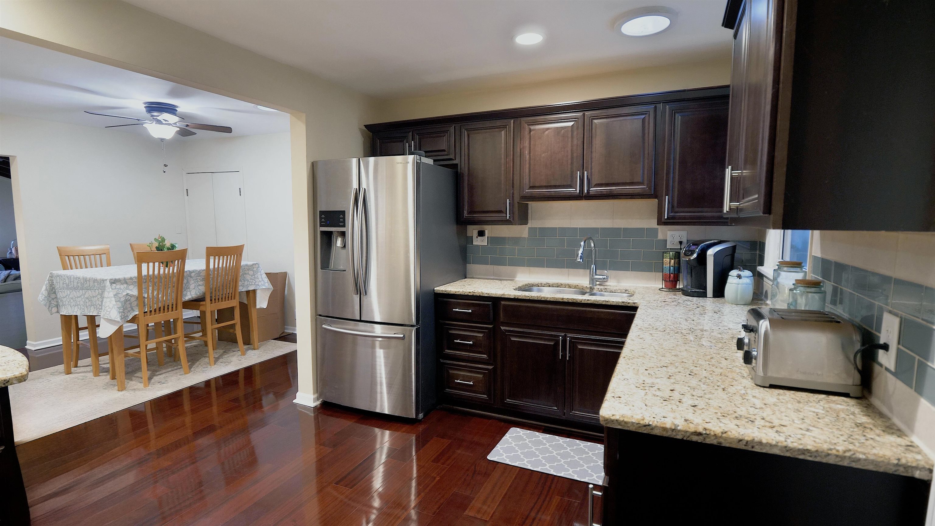 4626 Spring Creek Road Rockford, IL 61114 - Photo 8 of 31 a kitchen with a refrigerator stove and sink