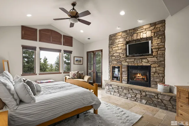 a bedroom with a bed and a view of bathroom