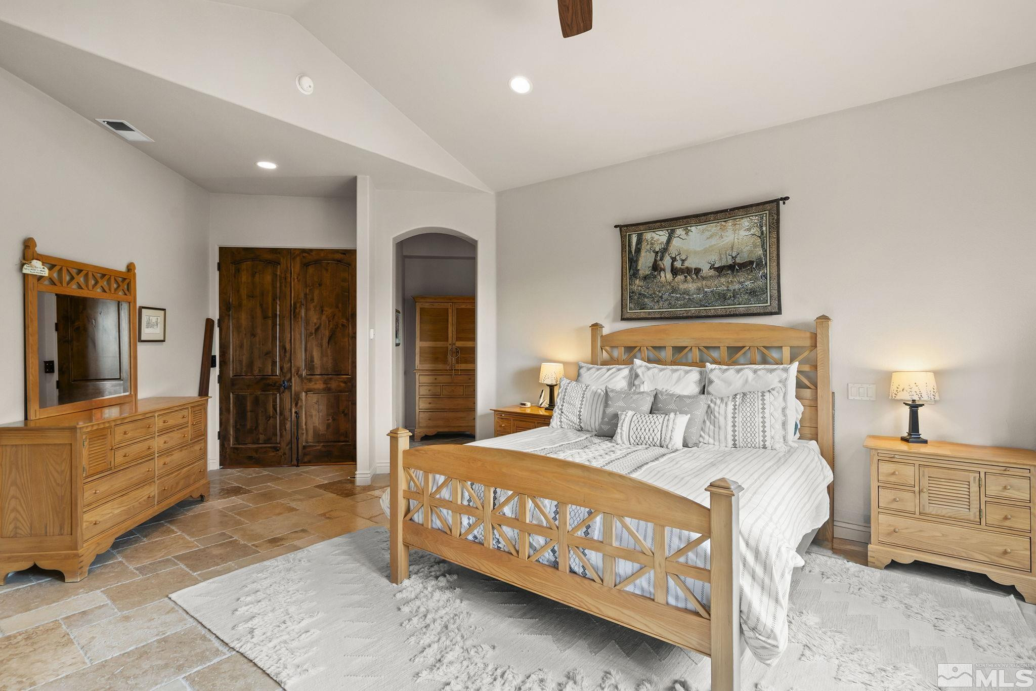 4660 West Pinewild Road Reno, NV 89511 - Photo 16 of 40 a bedroom with a bed and a view of bathroom