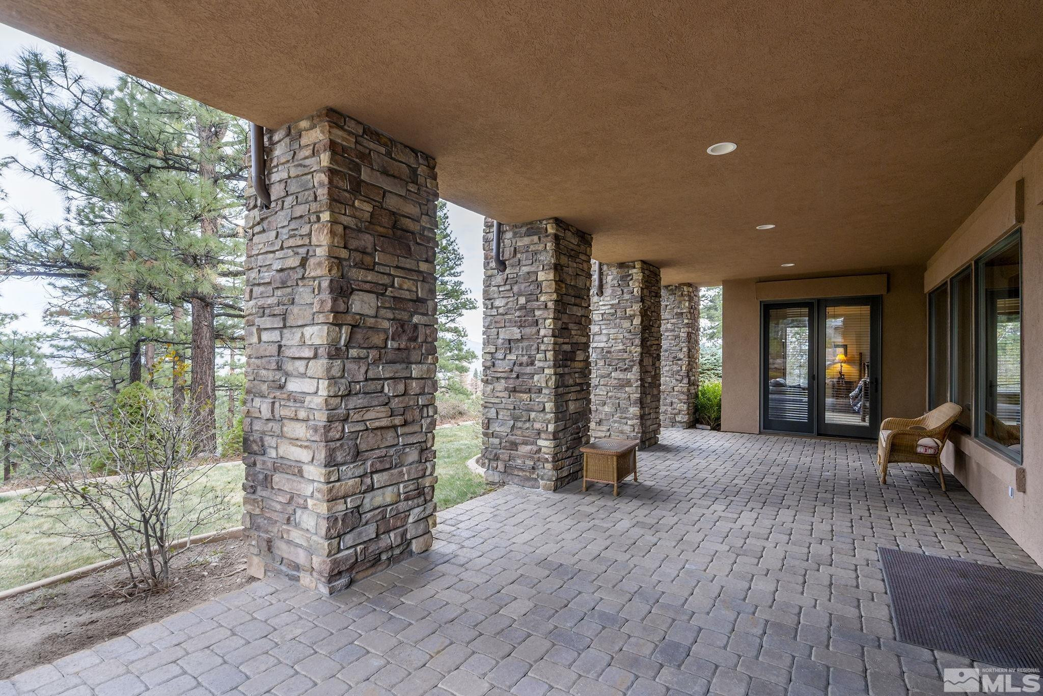 4660 West Pinewild Road Reno, NV 89511 - Photo 25 of 40 a view of livingroom with furniture and floor to ceiling window