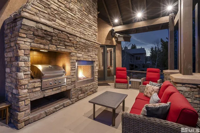 a view of a dining room with furniture and window