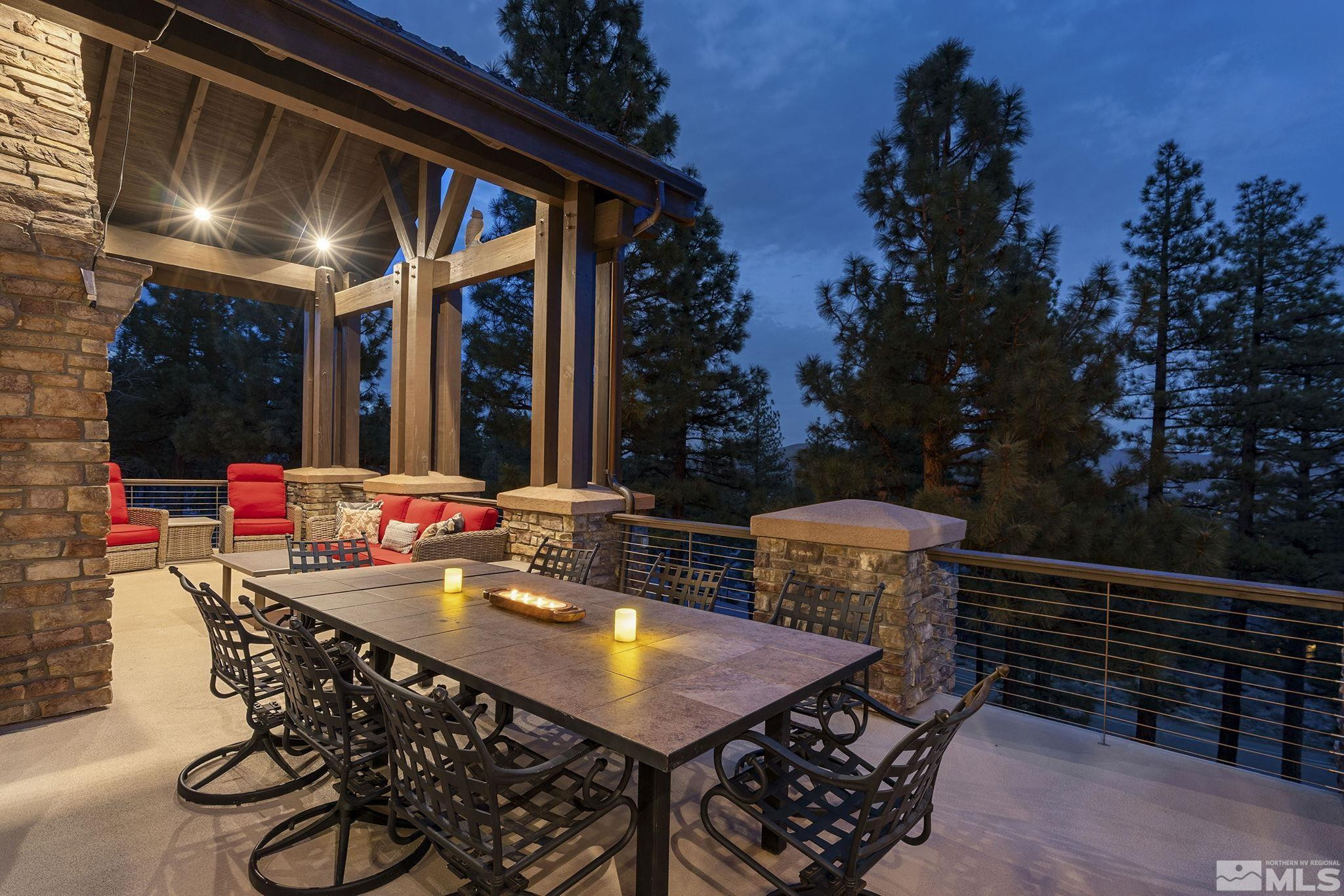 4660 West Pinewild Road Reno, NV 89511 - Photo 29 of 40 a outdoor dining space with furniture and city view