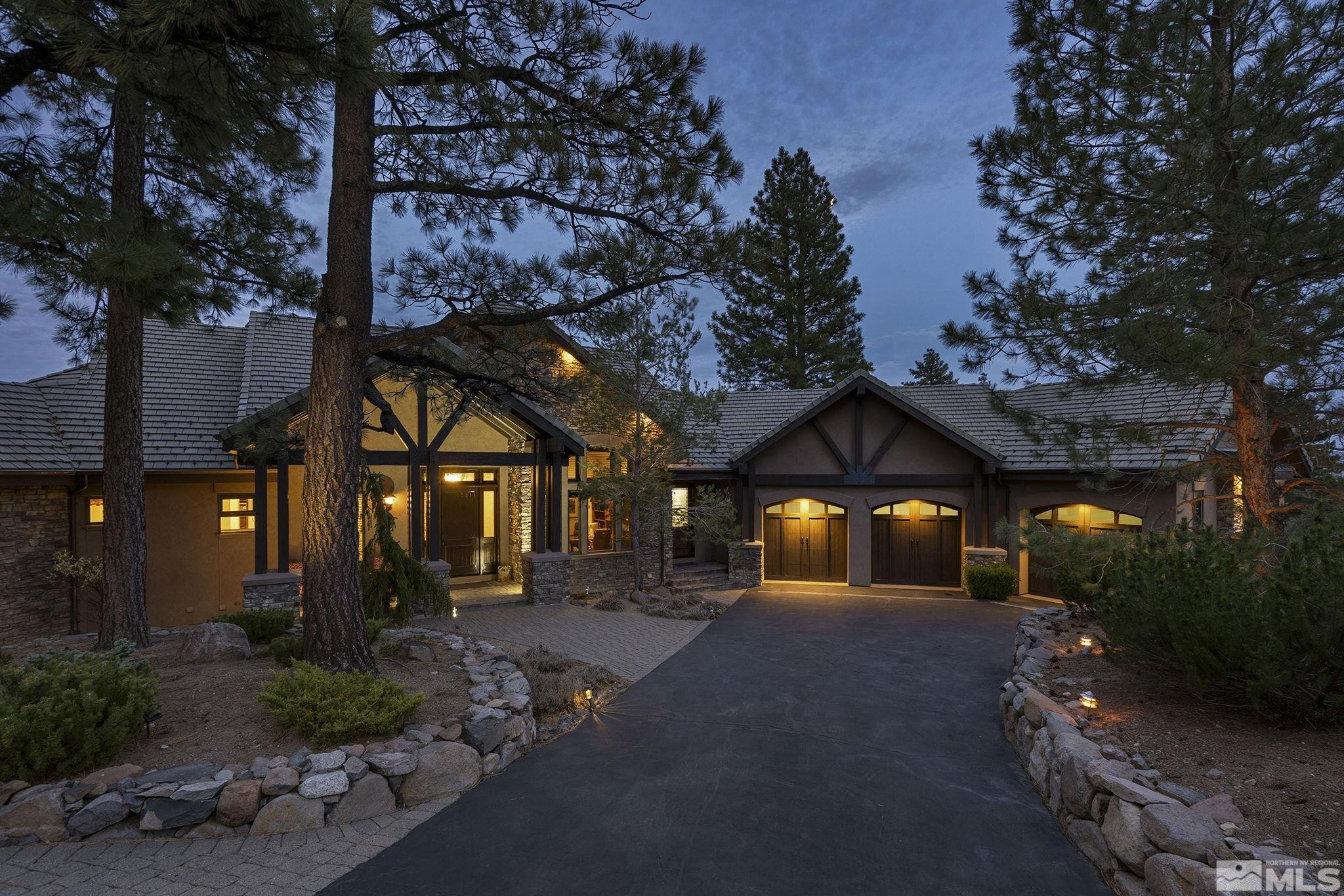 4660 West Pinewild Road Reno, NV 89511 - Photo 32 of 40 a front view of a house with garden