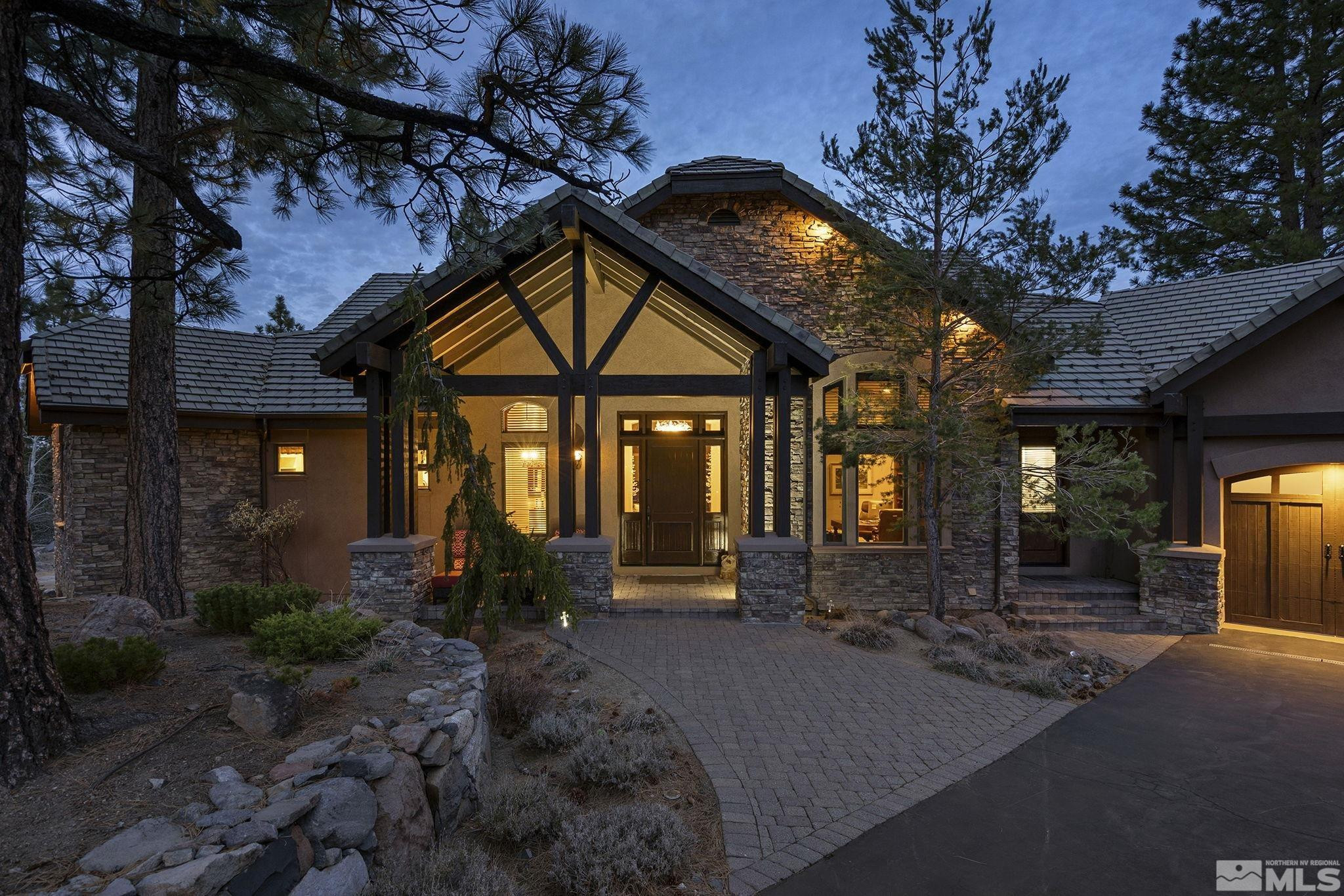 4660 West Pinewild Road Reno, NV 89511 - Photo 33 of 40 a front view of a house with garden
