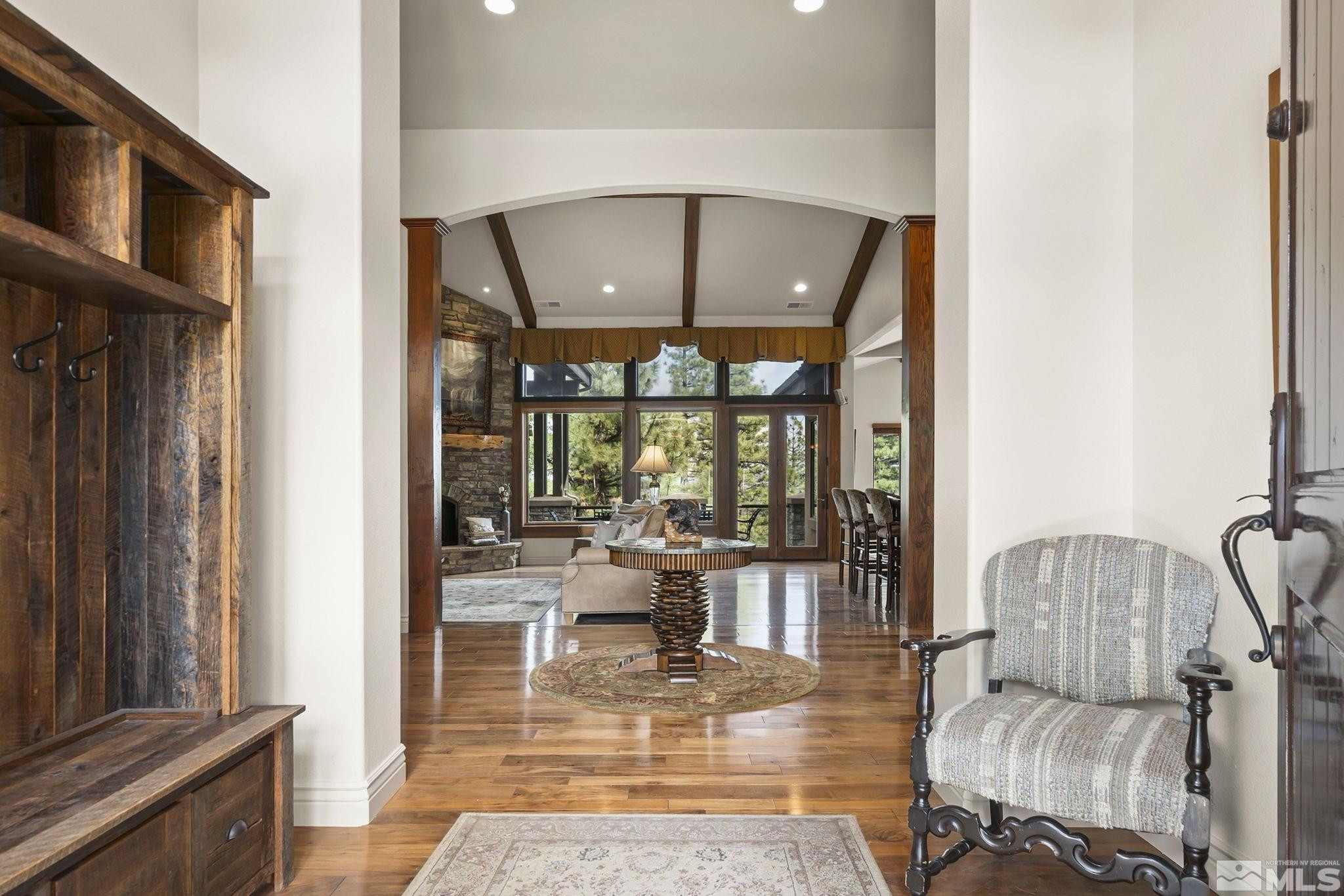 4660 West Pinewild Road Reno, NV 89511 - Photo 4 of 40 a living room with furniture and a large window