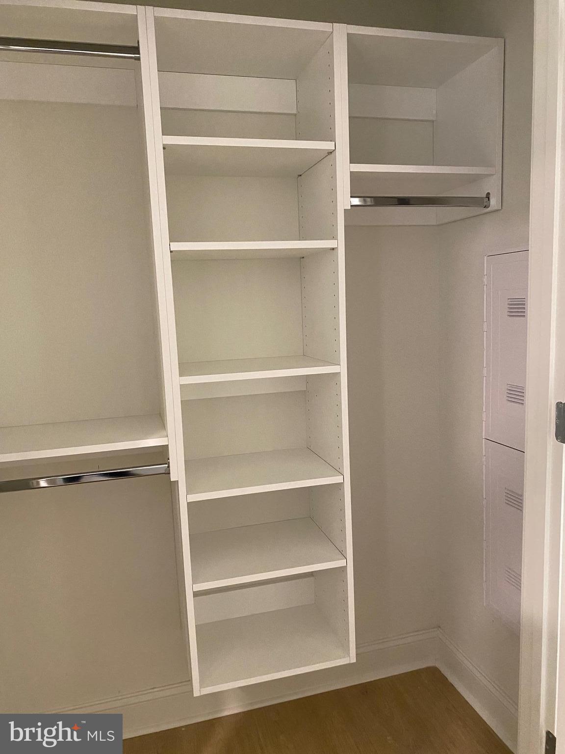 1900-20 Arch Street, Unit 109 Philadelphia, PA 19103 - Photo 9 of 34 a view of walk in closet with empty racks