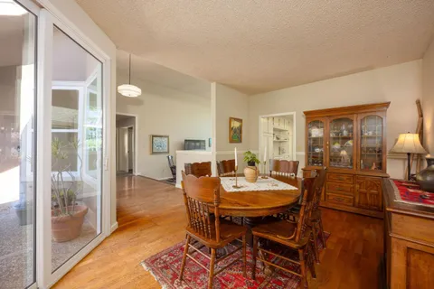 a view of a dining room with furniture