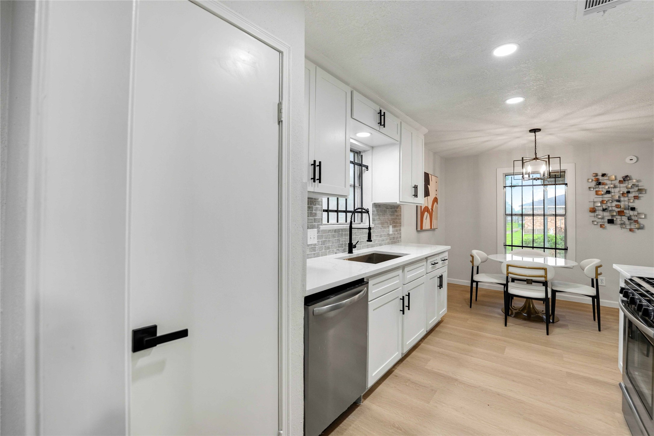 12703 Redfern Drive Houston, TX 77048 - Photo 13 of 28 The clean neutral palette creates a timeless foundation ready for your personal style and future customization.