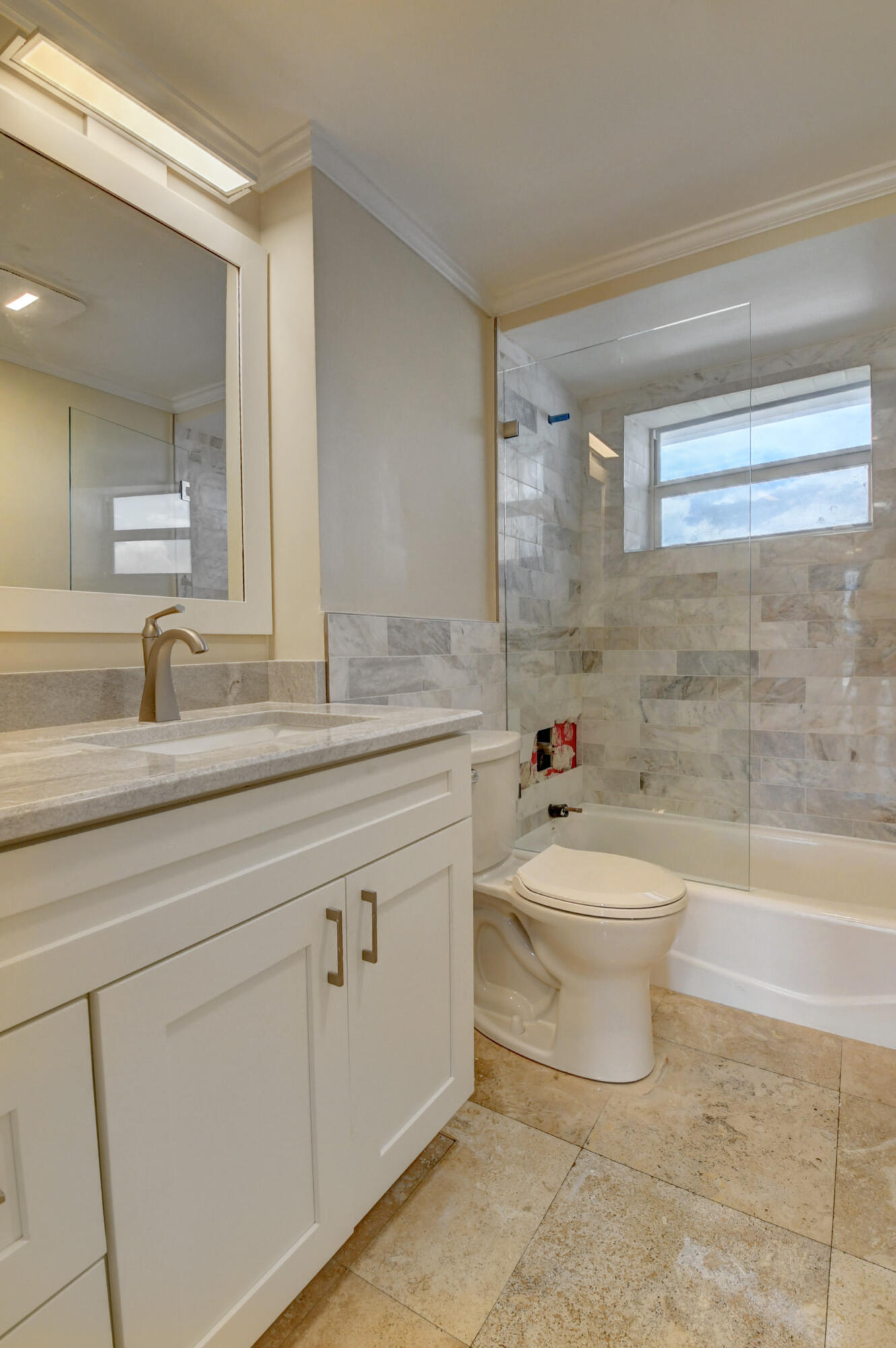 36 South Ocean Boulevard, Unit B3 Delray Beach, FL 33483 - Photo 3 of 47 a bathroom with a sink a toilet and bathtub