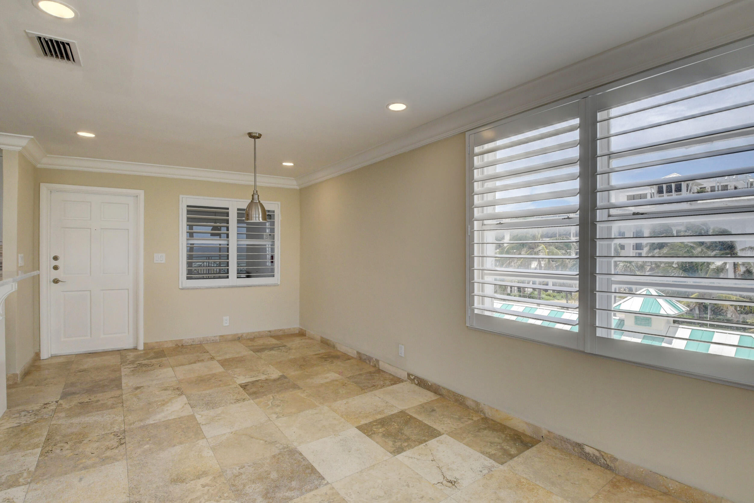 36 South Ocean Boulevard, Unit B3 Delray Beach, FL 33483 - Photo 10 of 47 a view of an empty room with a window