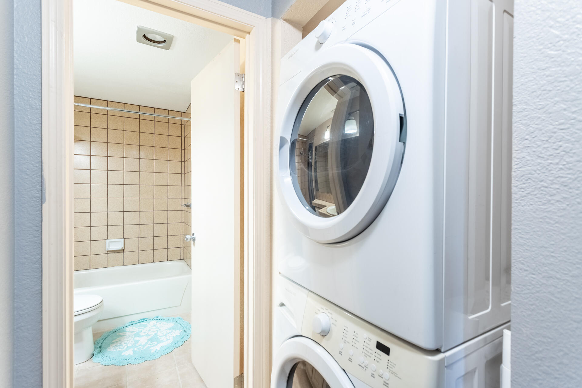 466 Ridgecrest Trail, Unit 136 Redding, CA 96003 - Photo 12 of 16 a view of a hallway with washer and dryer