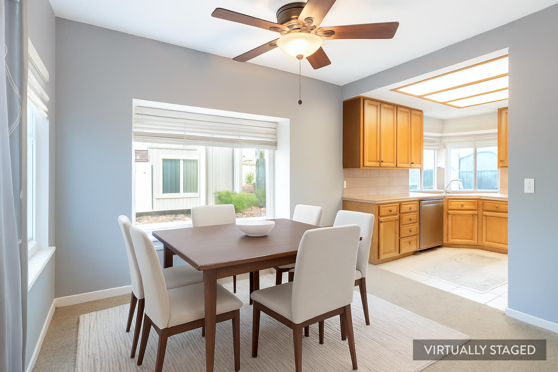 466 Ridgecrest Trail, Unit 136 Redding, CA 96003 - Photo 4 of 16 a view of a dining room with furniture window and wooden floor