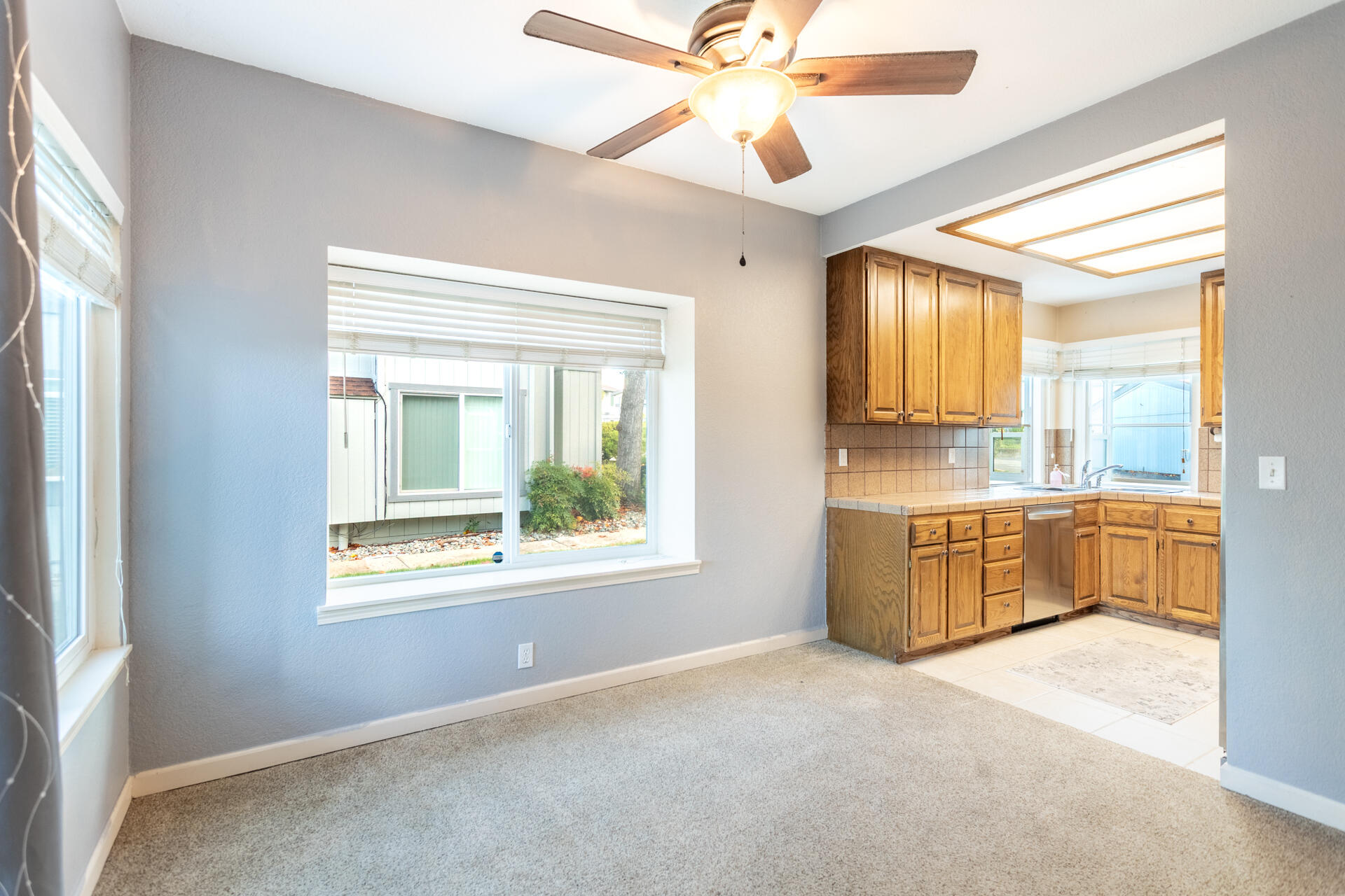 466 Ridgecrest Trail, Unit 136 Redding, CA 96003 - Photo 5 of 16 a view of an empty room with a window