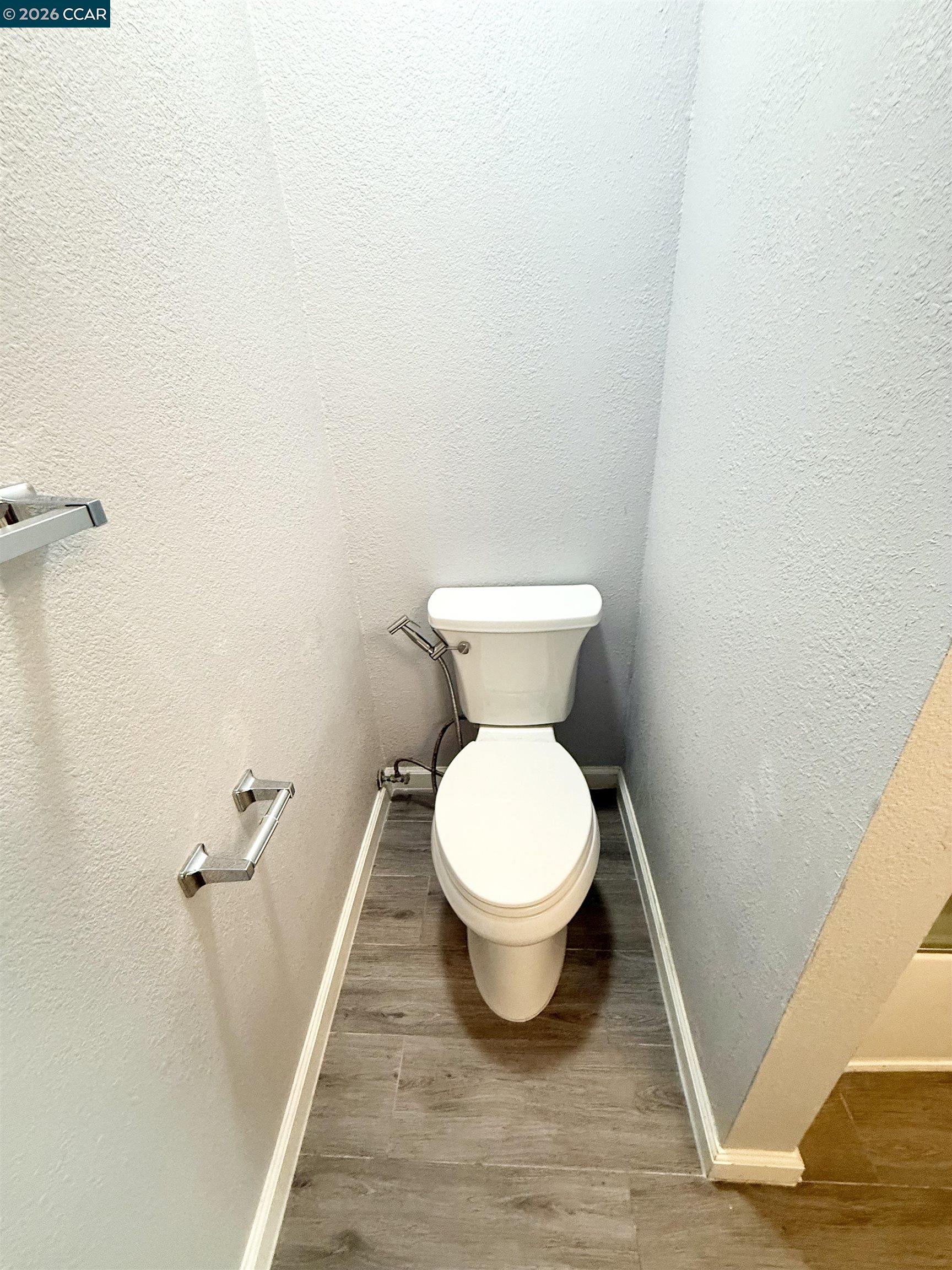 405 Weymouth Hercules, CA 94547 - Photo 13 of 22 a white toilet sitting next to a shower