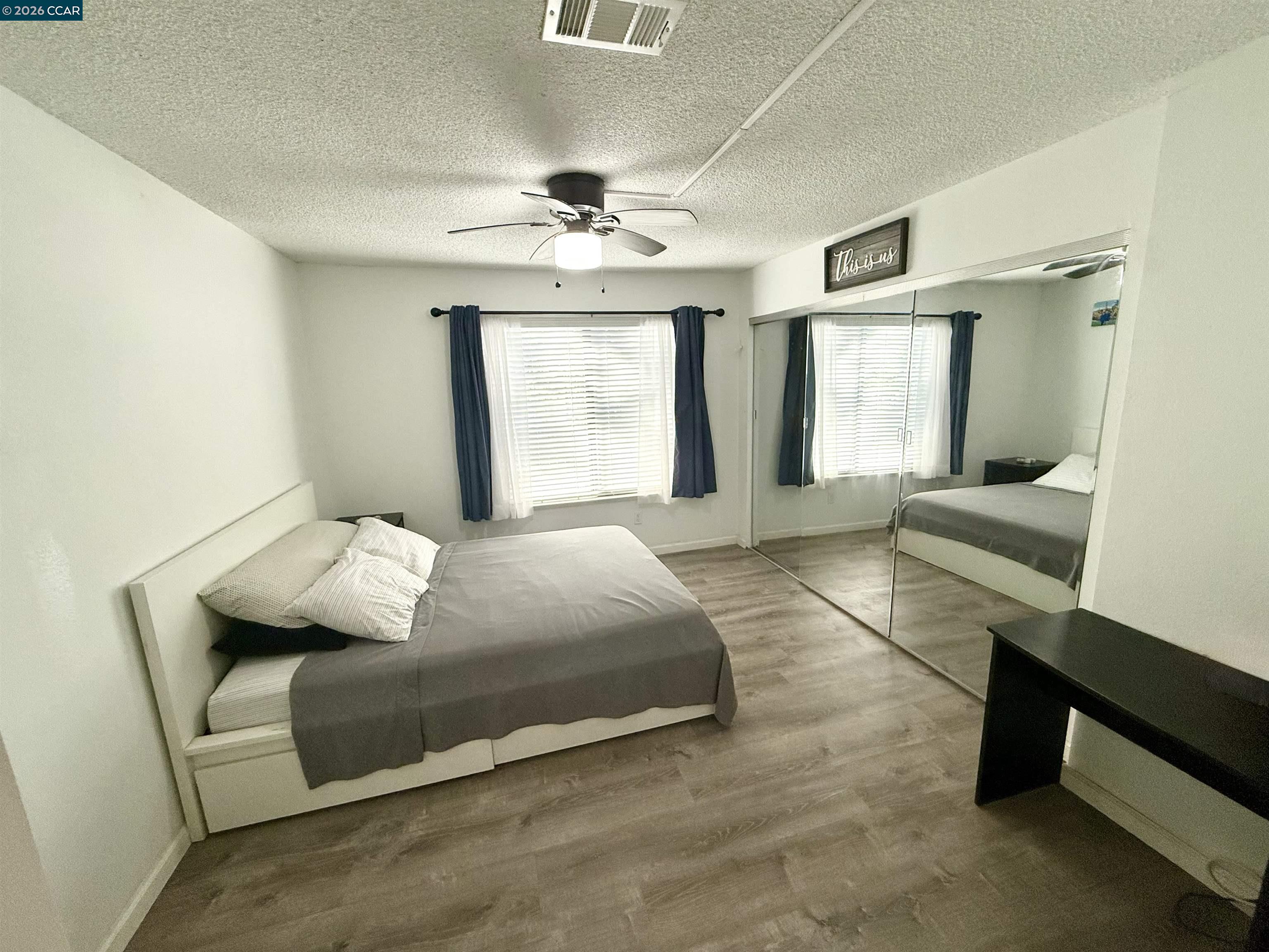 405 Weymouth Hercules, CA 94547 - Photo 16 of 22 a bedroom with a bed and window