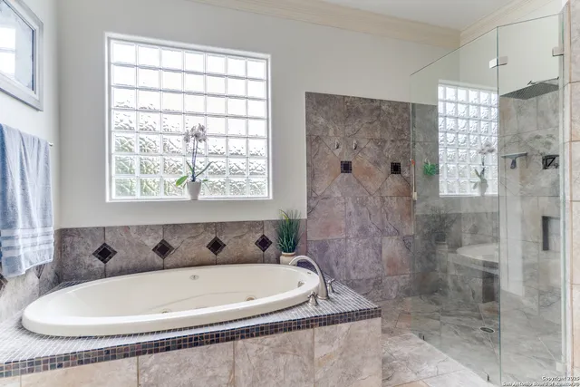 a bath tub sitting next to a window