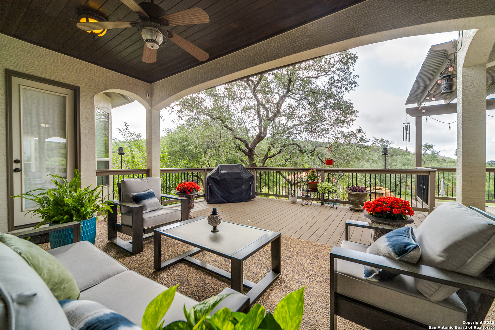 714 Ruidosa Downs Helotes, TX 78023 - Photo 30 of 42 a living room with furniture and a large window