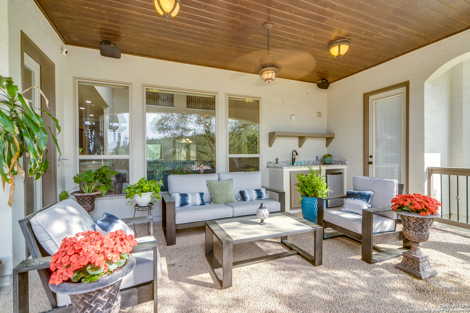 714 Ruidosa Downs Helotes, TX 78023 - Photo 31 of 42 a outdoor living space with furniture and a potted plant