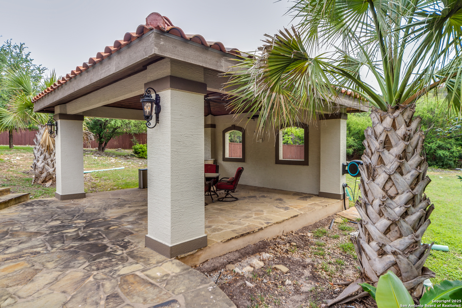 714 Ruidosa Downs Helotes, TX 78023 - Photo 34 of 42 a view of a house with a patio