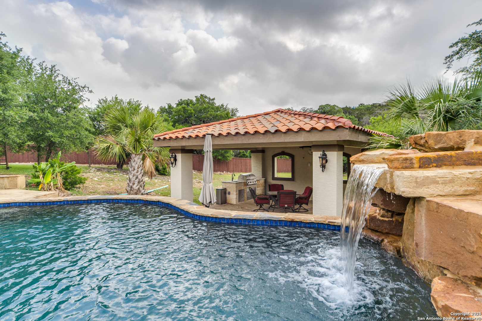 714 Ruidosa Downs Helotes, TX 78023 - Photo 35 of 42 a front view of a house with garden